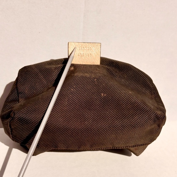 GUCCI
GUCCI 2000S BROWN MONOGRAM COSMETIC POUCH WITH GOLD 💛 ZIPPER PULL
$625 - Picture 6 of 11